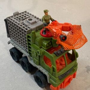 Fisher-Price Imaginext - Action Truck with Soldier and Dinosaur.